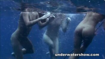 Naked Group Swimming